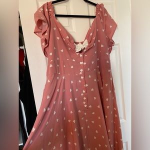 Unique vintage pink dress with white heart pok a dots.